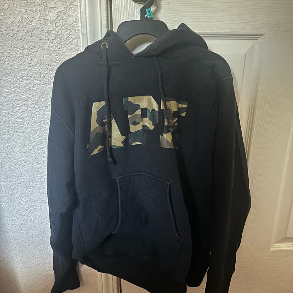 A bathing ape ( BAPE ) Champion Black Hoodie with Camouflage Logo
